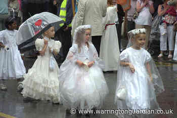 16 pictures from when it REALLY rained on Warrington Walking Day