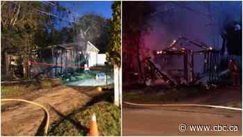 Saskatoon garage fire damages power lines, ruptures natural gas line