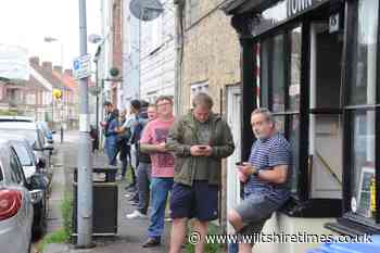 Queues formed outside barber shops in Trowbridge this morning as they re-opened for customers