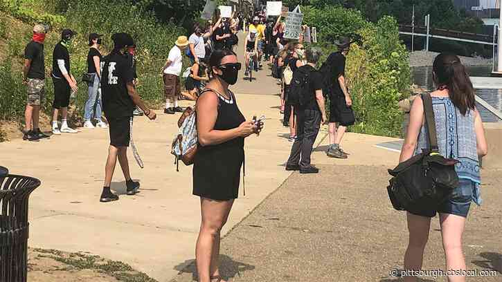 Protesters Gather To Protest Trump Boat Parade In Pittsburgh