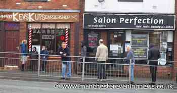 Customers queue outside Bolton barber shop as it reopens - Manchester Evening News