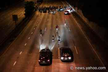 Two people critically injured after car plows into protesters on Seattle freeway