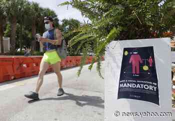 Florida's new coronavirus cases break record, nearly tying New York's peak