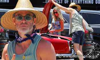 Chris Pine displays his toned arms in a tank top during grocery trip with Annabelle Wallis