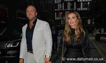 Love Island's Laura Anderson puts on a leggy display as she holds hands with new beau Tom Brazier