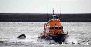 Man in sinking boat rescued after drifting two miles out to sea