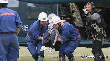 Flooding in southern Japan leaves up to 34 dead