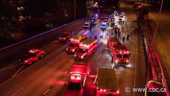 1 of 2 protesters hit by vehicle on Seattle freeway dies; man, 27, charged with vehicular assault