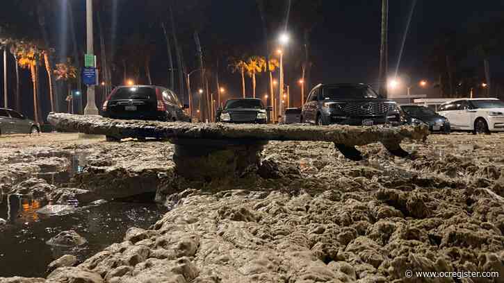Higher, wider berm stops more flooding in Newport Beach on Saturday night