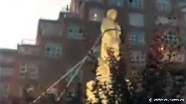 Christopher Columbus statue toppled by Baltimore protesters