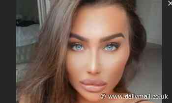 Lauren Goodger puts on a VERY busty display in a tiny bralet and sporty