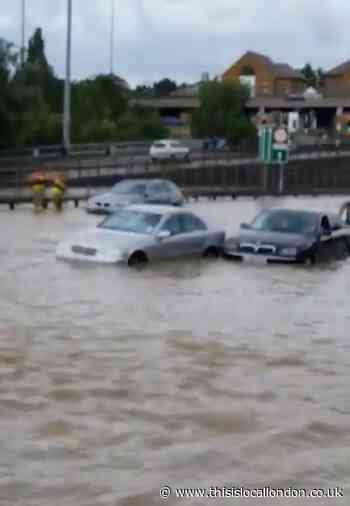 Cars stranded as A406 flooded near Brent Cross