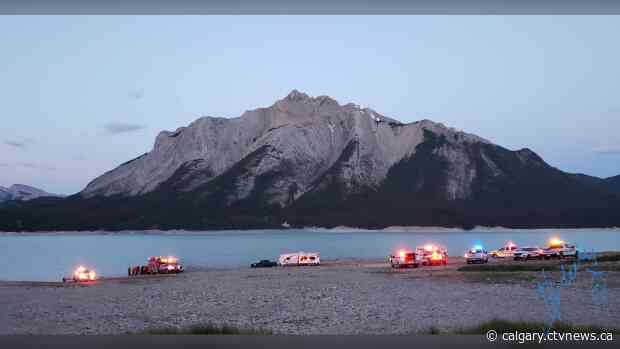 2 adults and a youth rescued after spending roughly 90 minutes in icy water of Abraham Lake