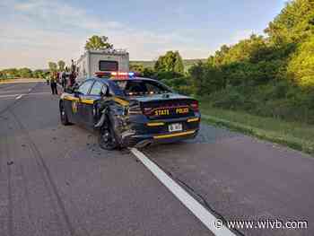 State police vehicle struck on I-86