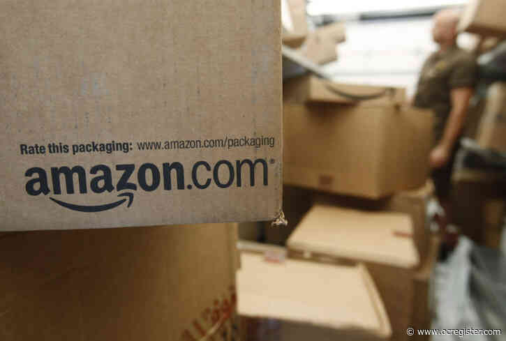 Amazon shares top $3,000 for the first time