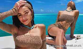 Olivia Culpo flaunts her stunning curves in a crop top while living her best life on vacation