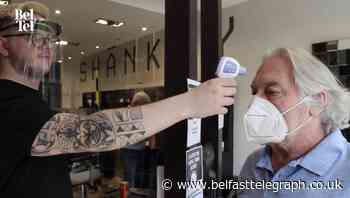 Locks come off as barbers and hairdressers raise shutters