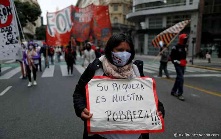 Argentina's sweetened debt offer wins early support; bonds climb