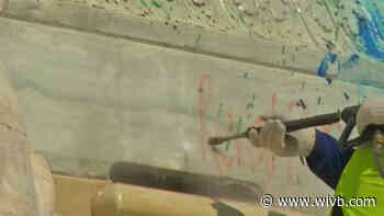 Workers clean vandalized McKinley monument