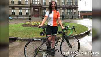 Fastest woman to bike across Canada arrives in Halifax, raises over $30,000 for ovarian cancer