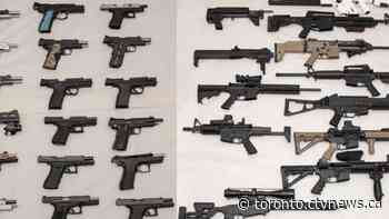 Traffic stop leads to seizure of more than two dozen firearms and drugs