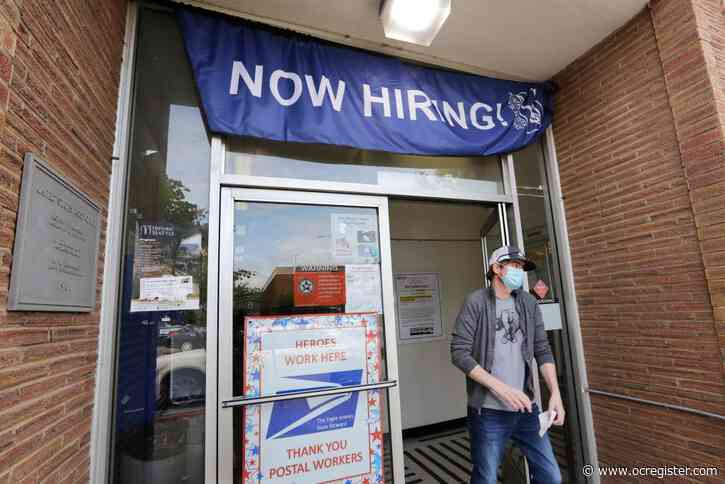 Hiring soared in May as mass layoffs eased