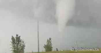 Tornado alert issued around same time Alberta family captures video of funnel cloud near highway