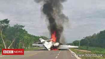 Suspected drug plane bursts into flames in Mexico after highway landing