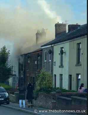 Firefighters and police rush to fire following "explosion" at Bolton house - The Bolton News
