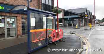 Driver hits bus stop & bollard near Lidl supermarket then flees