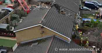 One dead and four injured after crane crushes London houses