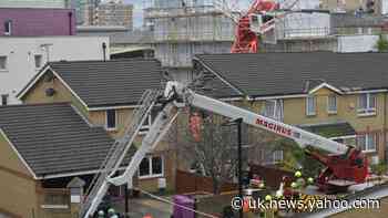 Elderly woman rescued by locals after crane collapsed on house – eyewitness