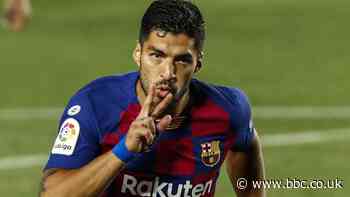 Suarez gives Barcelona victory and relegates city rivals Espanyol