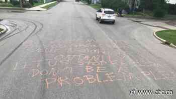 Saskatoon cyclist jarred by racist graffitti sprayed on Sutherland street - CBC.ca