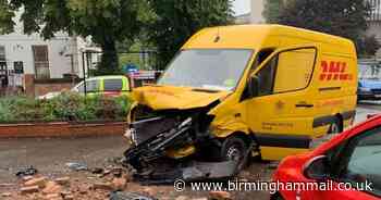 Wall demolished and van written off in city crash