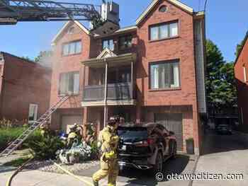 Crews contain fire to one side of double in Old Ottawa East