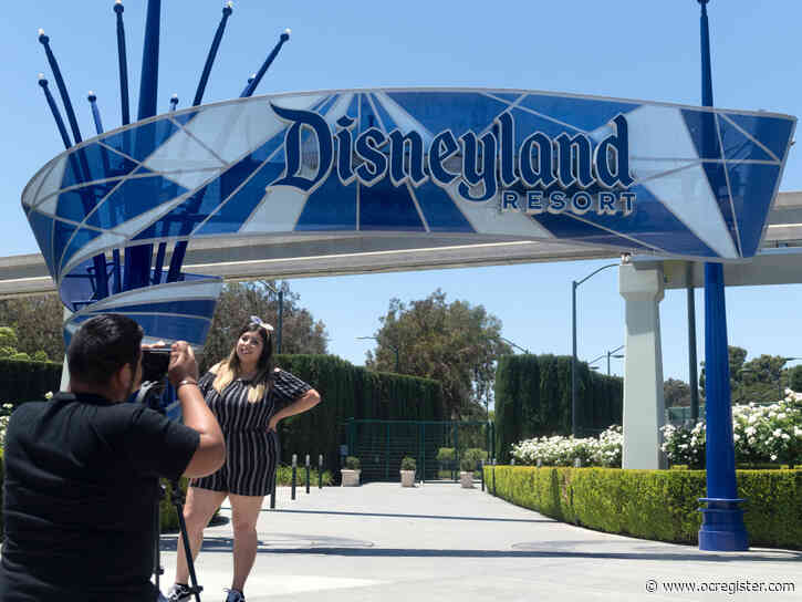 Long lines greet reopening of Downtown Disney