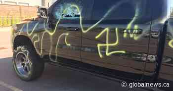 Racist graffiti spray-painted on vehicles, windows smashed in southwest Edmonton