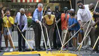 NY mayor helps paint Black Lives Matter in front of Trump Tower