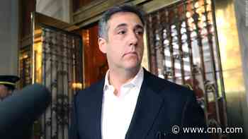 Michael Cohen back in custody for violating terms of early release from prison