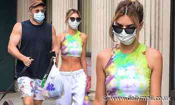 Emily Ratajkowski flaunts toned midriff in tie dye crop top with matching sweats in New York City