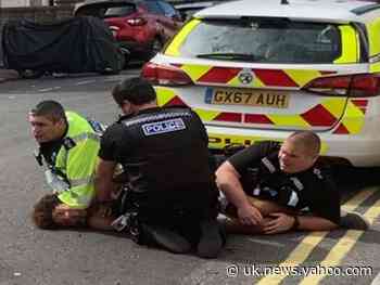 Sussex Police officers pin man on road as he shouts ‘I can’t breathe’