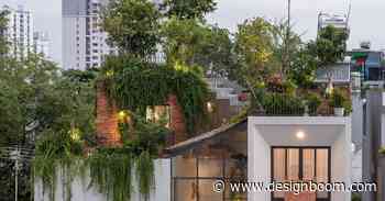 MDA architecture tops house in vietnam with lush roof park - Designboom