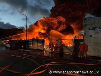 Fire at Ince scrapyard sees crews battle overnight - The Bolton News