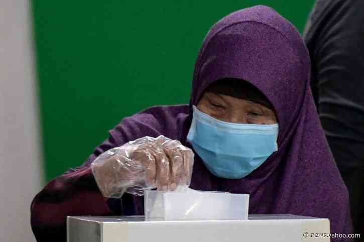 Singapore ruling party&#39;s support slips in pandemic poll
