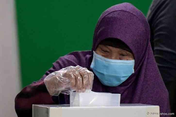 Singapore ruling party's support slips in pandemic poll