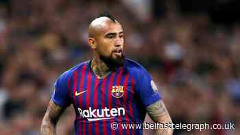 Vidal secures Barcelona win as Messi snatches a piece of history