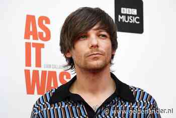 Louis Tomlinson weg bij platenlabel Simon Cowell
