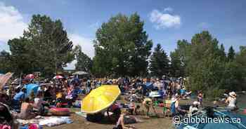 Beachgoers crowd Sylvan Lake despite pandemic rules: ‘COVID-19 is still here’