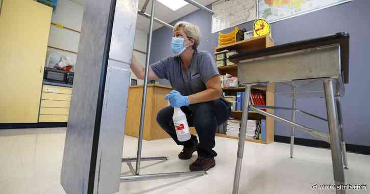 Virus spread, not politics should guide schools, doctors say